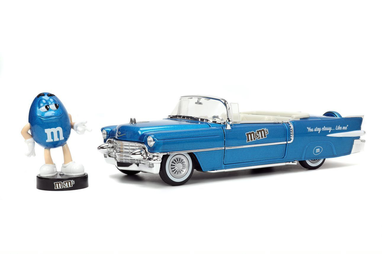 JADA 33726 CADILLAC ELDORADO CON FIGURA BLU M&MS BLU HOLLYWOOD RIDES 1956 1/24