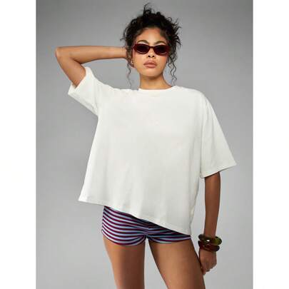 T-shirt oversize in jersey di cotone da spiaggia e vacanza estiva, con stampa di limoni della costiera amalfitana, vacanza mediterranea casual