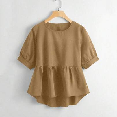 Blusa peplum a taglio alto e basso, top peplum