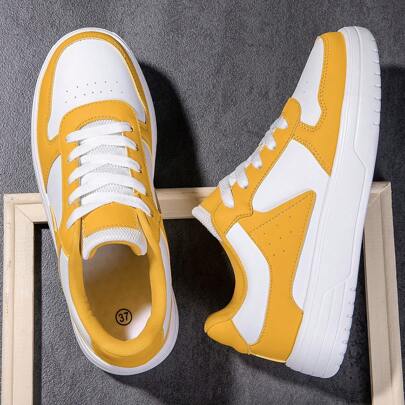 Sneaker casual alla moda gialli/bianchi unisex per lo sport degli uomini