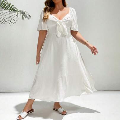 Abito bianco elegante e comodo da donna con scollo quadrato, vita segnata, maniche corte e lunghezza media, adatto a vacanze, matrimoni, crociere, bru