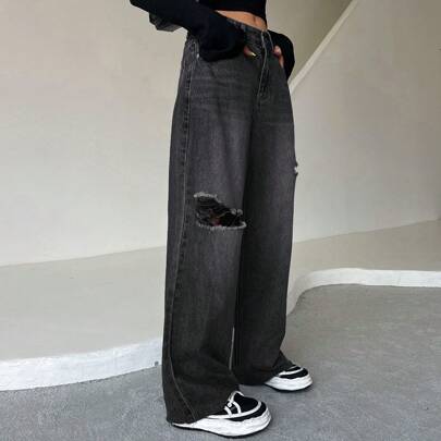 Jeans A Gamba Larga Strappati Con Orlo Grezzo, Lavaggio Con 'whisker' Di Gatto