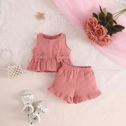 Bimba fiocco frontale con volant Canotta & con volant Shorts