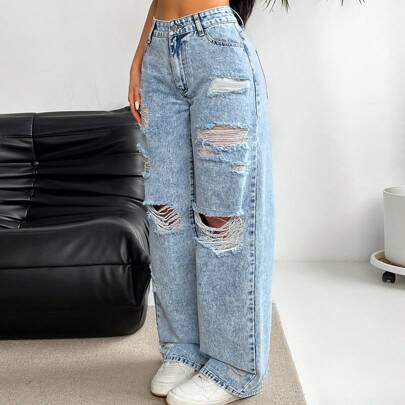 Jeans alla moda da donna con effetto usato e sbiadito dal taglio largo