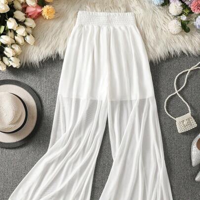 Pantaloni casual romantici a tinta unita con orlo arricciato