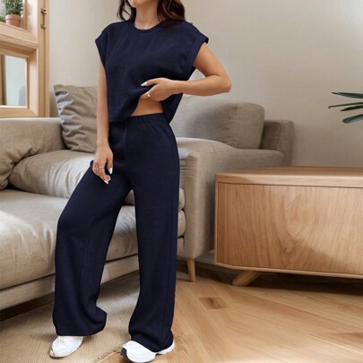 Completo casual lasco in maglia blu scuro per donna