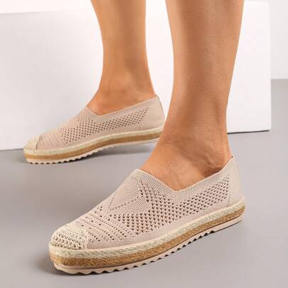 Espadrillas con tomaia traforata e treccia sulla suola e sulla punta
