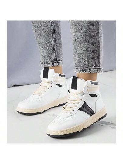 Sneaker bianche e nere stringate alte