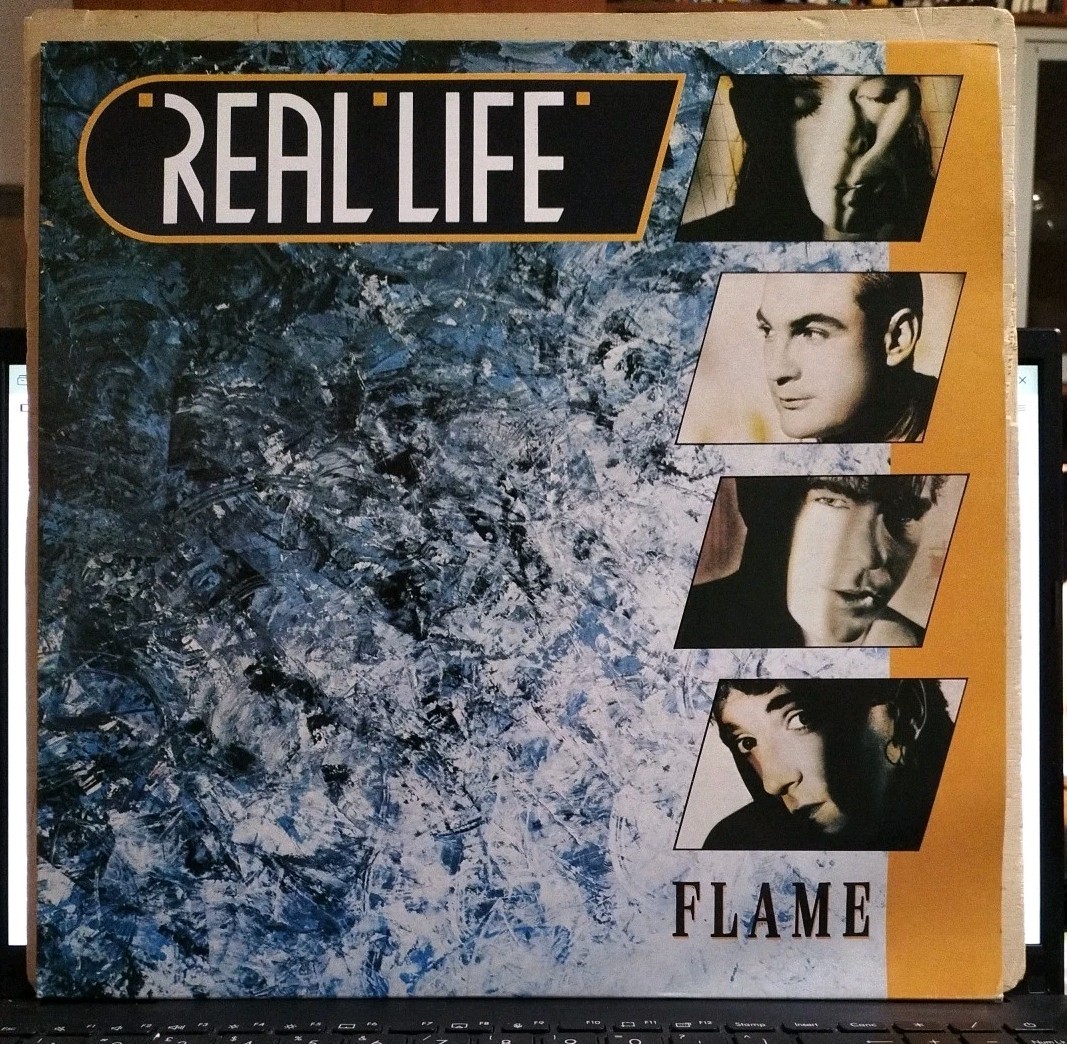 LP - REAL LIFE - Flame (vinile, 1985 33 NUOVO  synth-pop, new wave