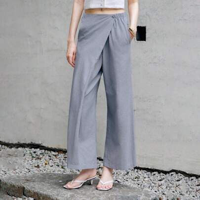 Pantaloni verdi casual chic dal design minimalista con pences oblique, vita alta e gamba ampia