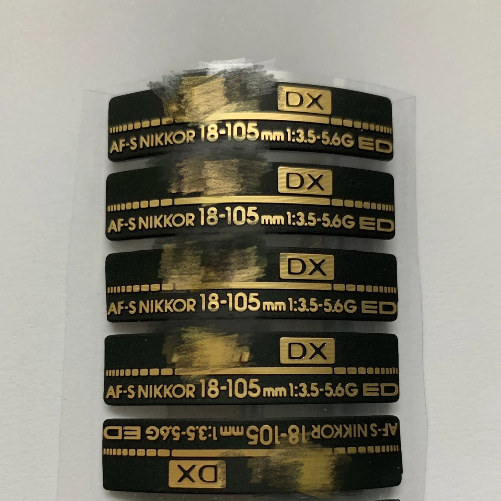 1 Pz Nuovo Per Nikon 18-105 18 105 Logo Targhetta Etichetta Accessori Per La Riparazione Dell'Obiettivo