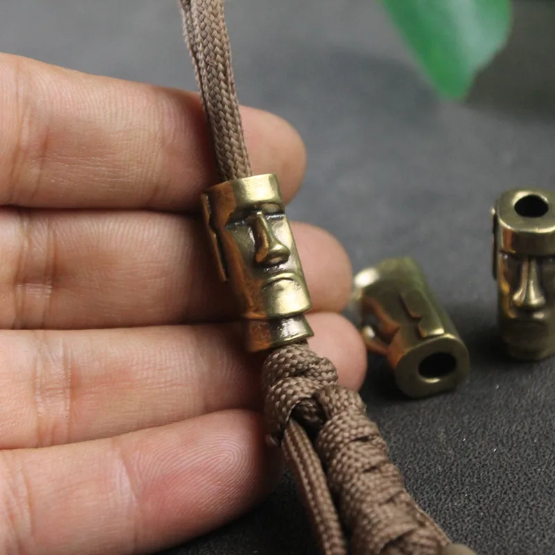 Isola Di Pasqua Moai Stone Statue Watchman Knife Beads Ottone Intrecciato Paracord Cordino Pendenti Outdoor Edc Ombrello Corda Accessori