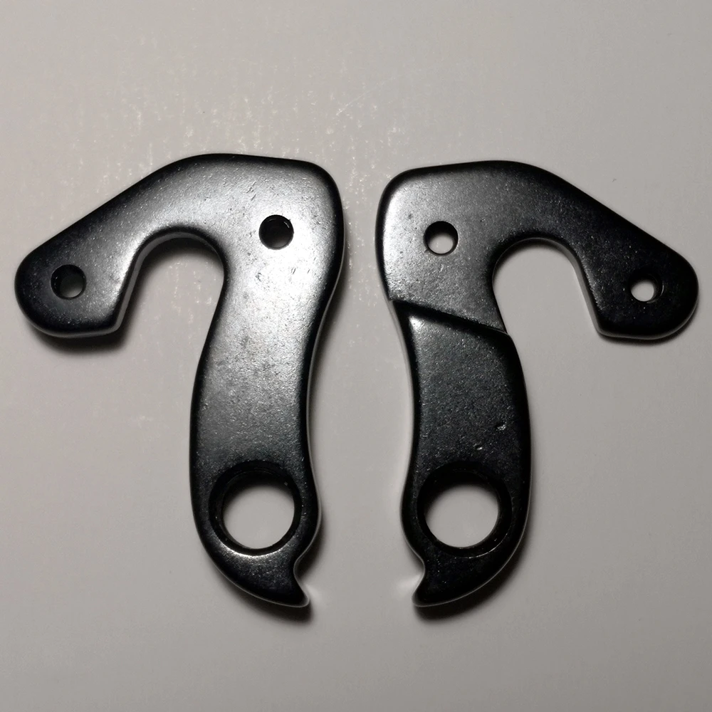 1Pc Bicicletta Gear Deragliatore Posteriore Gancio Mech Dropout Per Lee Cougan Bulls Go Outdoor Caliber Bossnut Evo Beastbut Whyte Dropwh20
