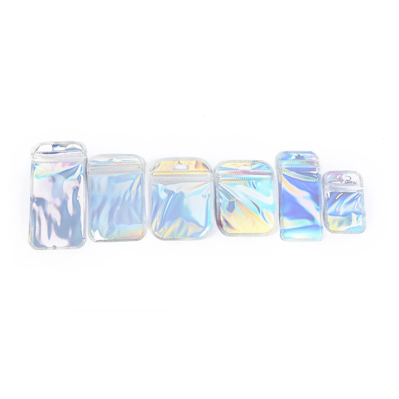 50Pcs S/M/L Piatto Zip Blocco Di Sale Da Bagno Sacchetto Cosmetico Un Lato Trasparente Olografica Laser Mini Foglio Di Alluminio Zip Borse Di Blocco D