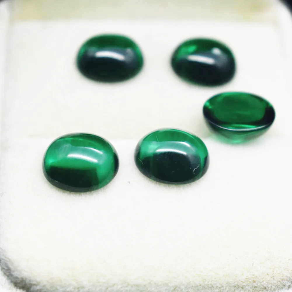 Cabochon Ovale Smeraldo Di Alta Qualità Superficie Liscia Lucidata A Forma Di Uovo Vivid Green Emerald Cabochon Retro Piatto Er062
