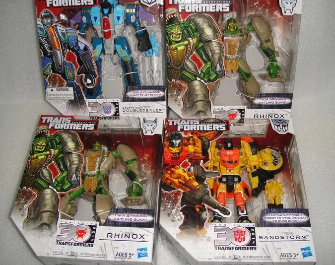 Hasbro Trasformatori Action Figure Idw Roadmaster Megatron Sandstorm Alsi Soundboard Puleggia Deformazione Modello Mobile Giocattolo