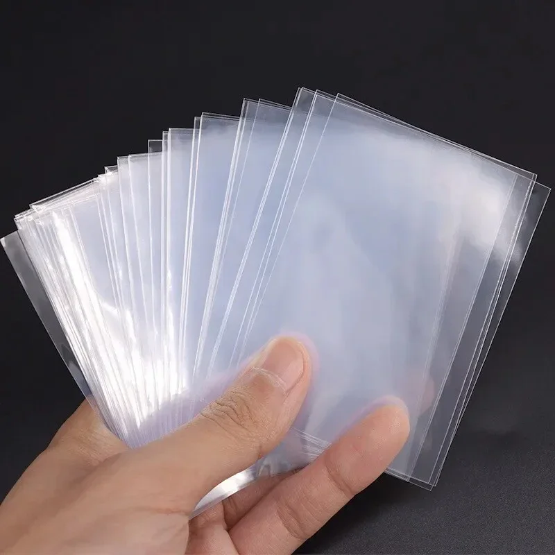 Manicotti Protector 50-100Pcs Pokemon Card Game Sacchetto Di Immagazzinaggio Trasparente Magic Board Play Tarocchi Cover Per Bambini Giocattolo Access