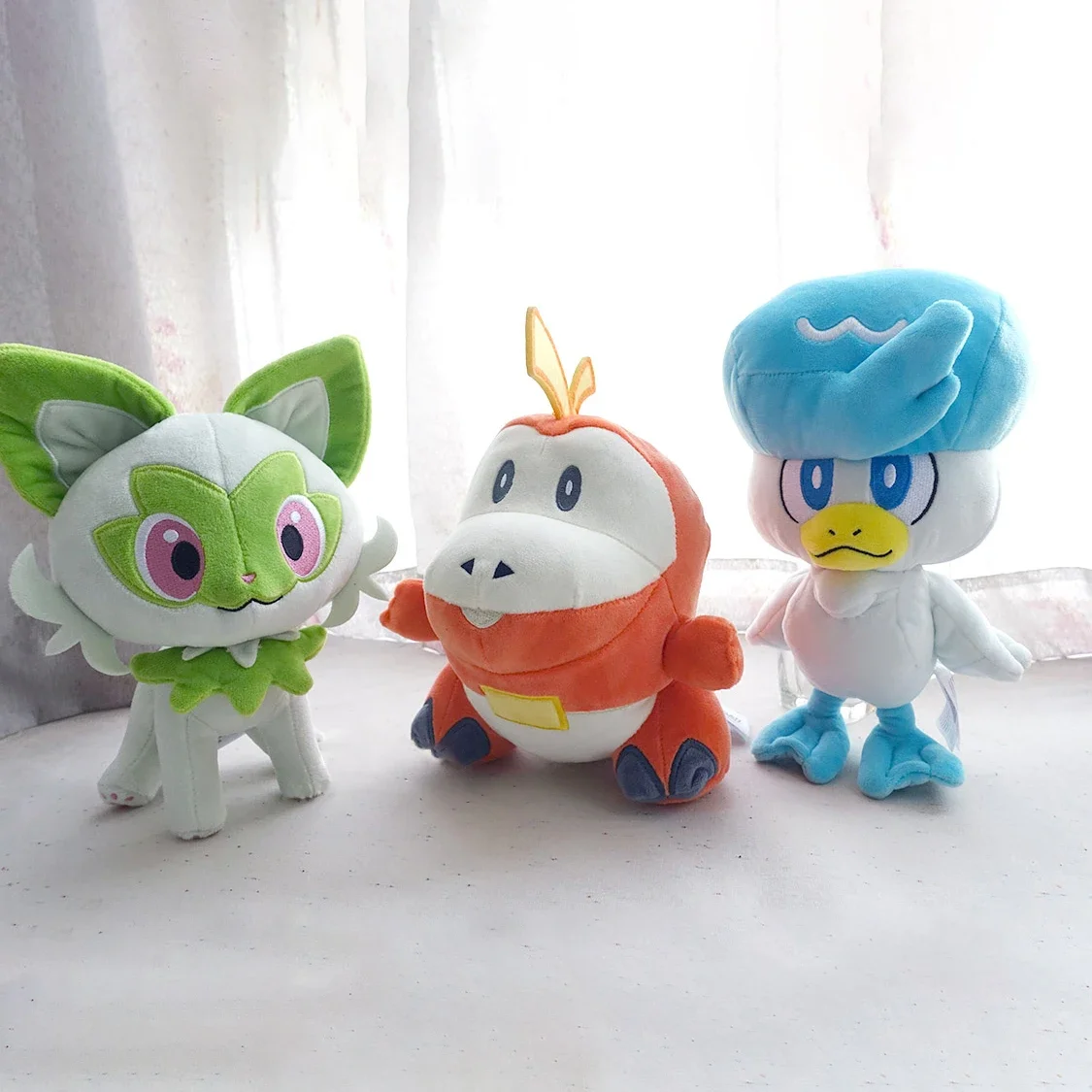 Pokemon Sword & Shield Peluche Sprrigato Quaxly Fuecoco Peluche Doll Scorbunny Grookey Sobble Fingers Toy Hobby Regalo Di Natale Per Bambini