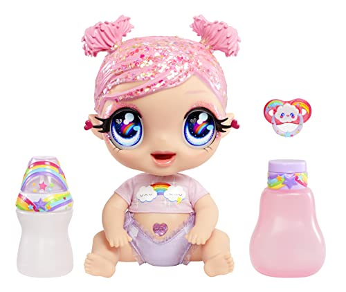 Mga'S Glitter Babyz - Dreamia Stardust - Bambola Con 3 Cambi Di Colore, Capelli Rosa Glitterati, Vestito Arcobaleno, Pannolino, Biberon E Accessori -