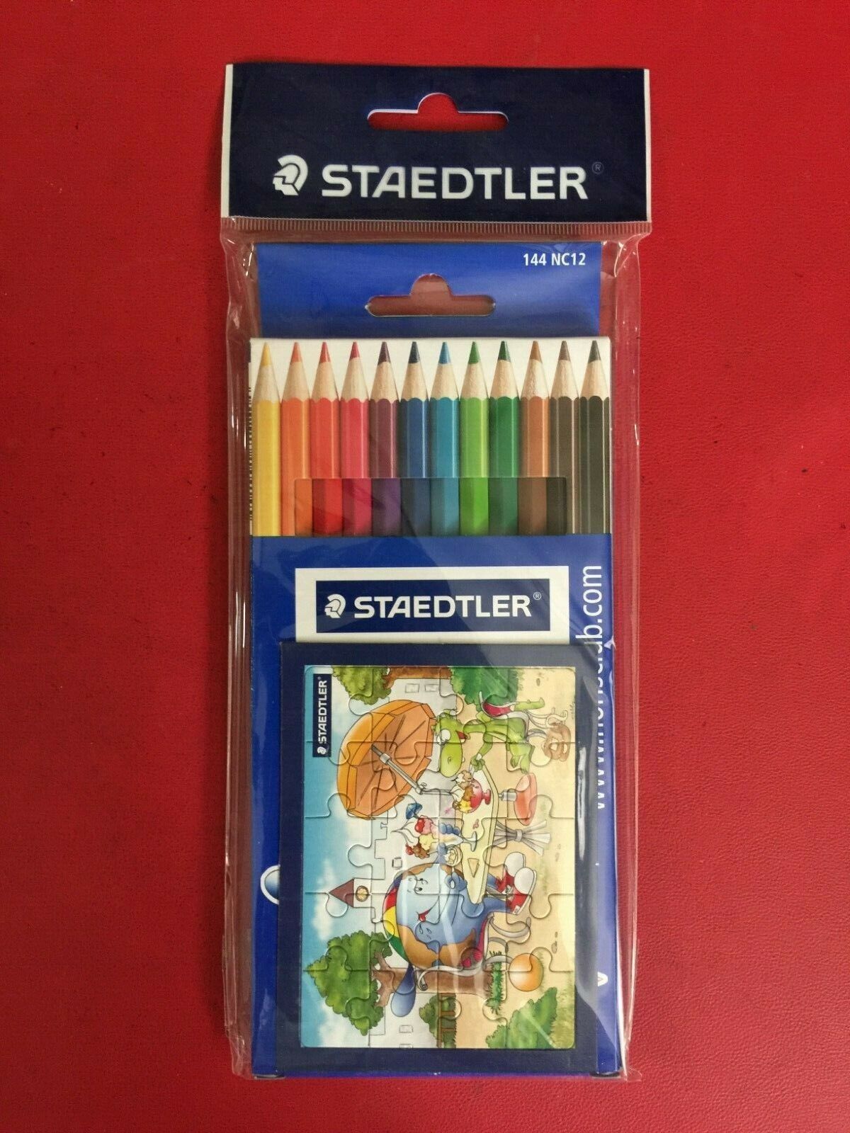 STAEDTLER BOX/SCATOLA 12 MATITE COLORATE + MINI PUZZLE Art. 144 NC12 NUOVO !!!