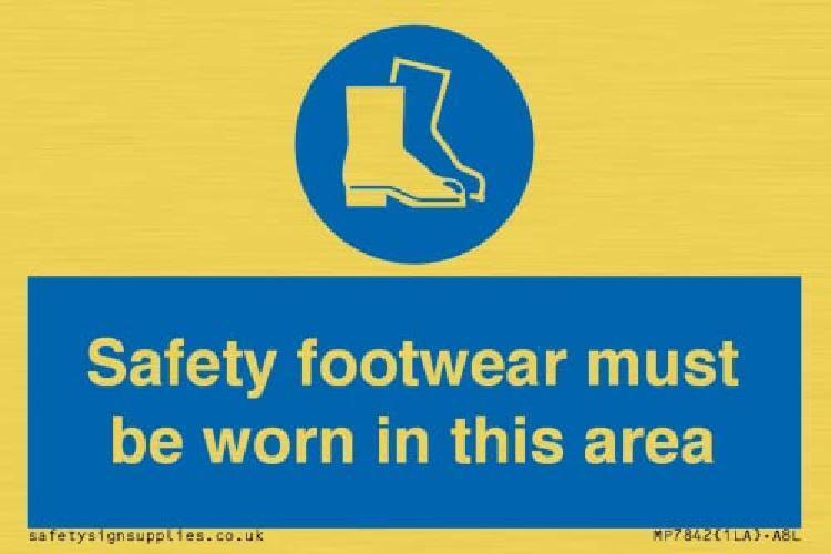 Cartello con scritta "Safety footwear must be worn in this area" – 75 x 50 mm –
