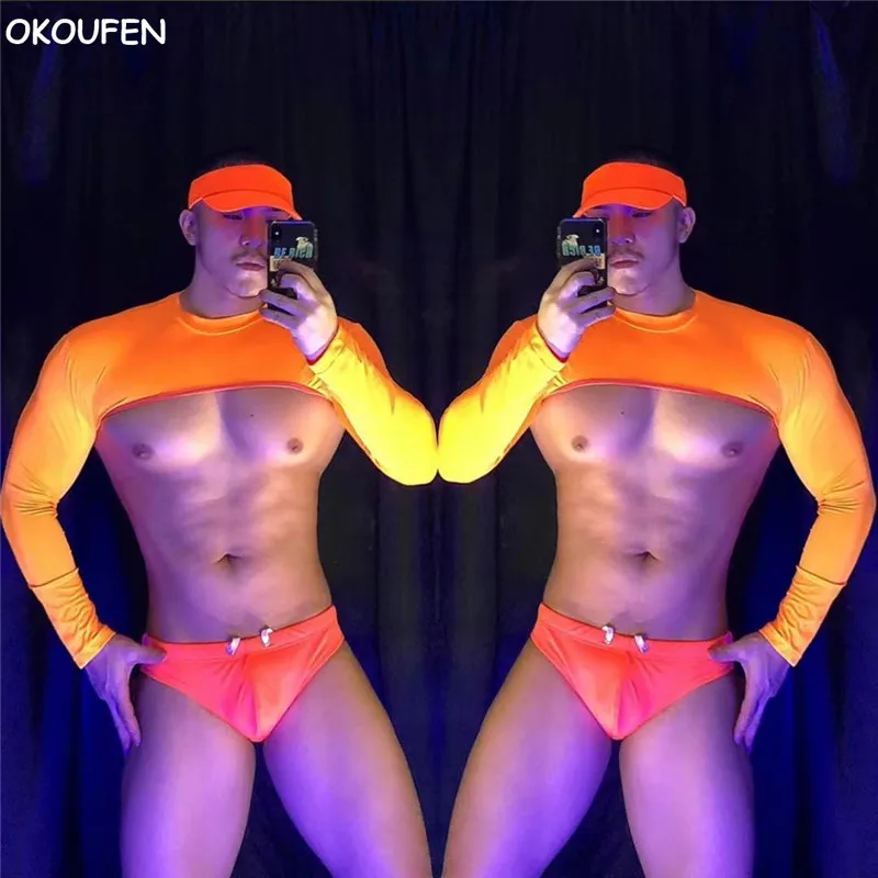 New Fluorescente Orange Hollow Mesh Costume Suit Uomo Sexy Muscle Dance Wear Nightclub Bar Singer Ds Stage Performance Abbigliamento