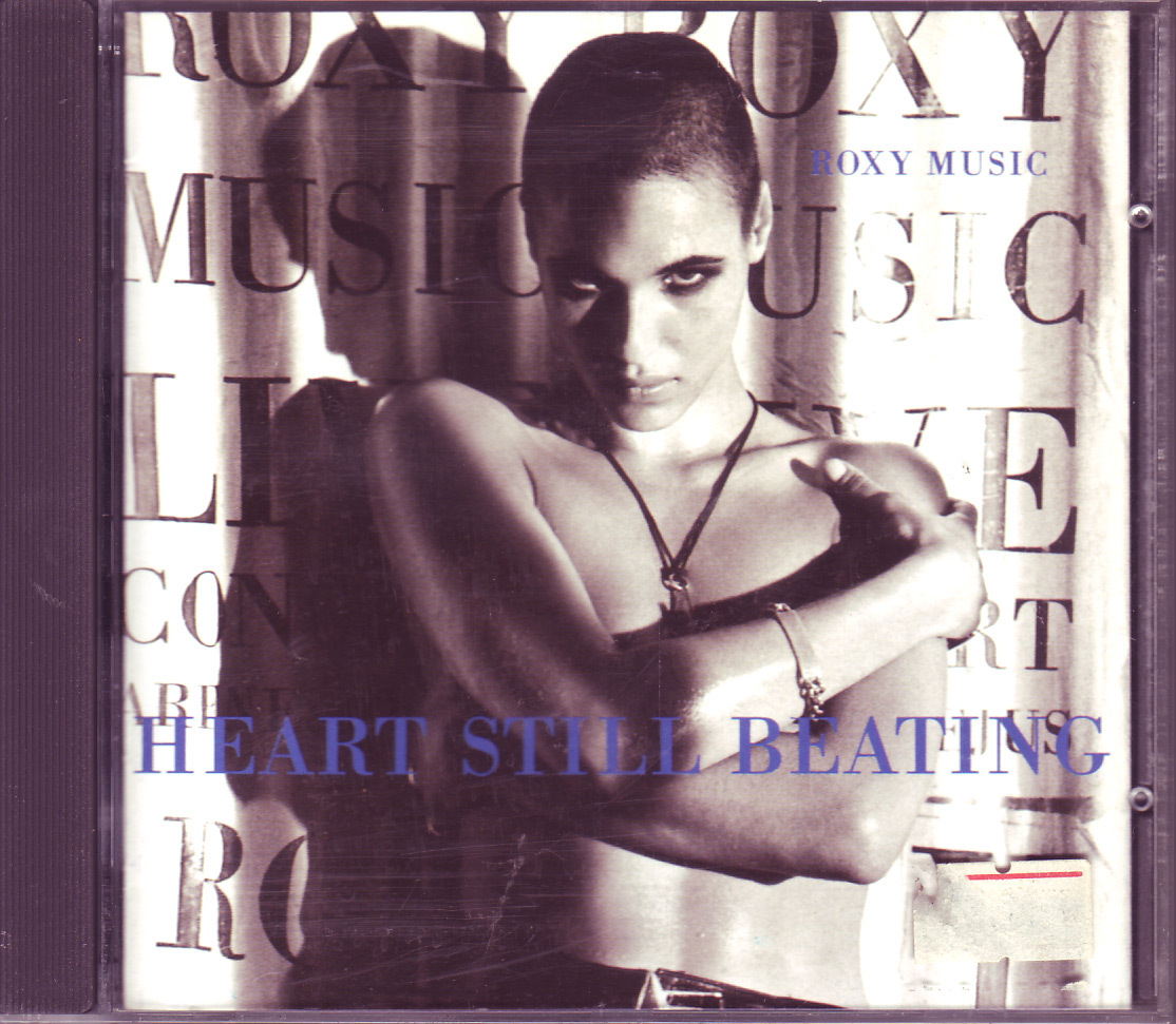 ROXY MUSIC - HEART STILL BEATING