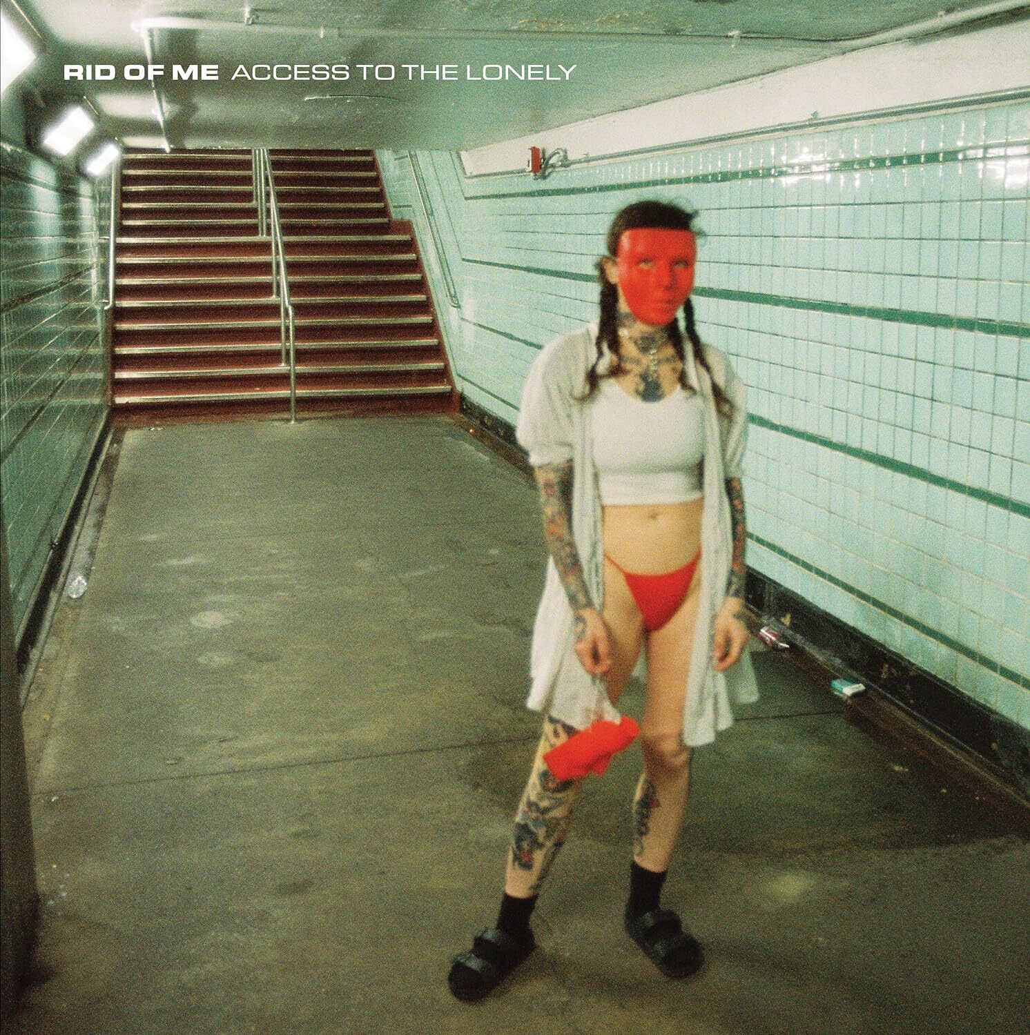 Rid Of Me Access to the Lonely (Cassette)