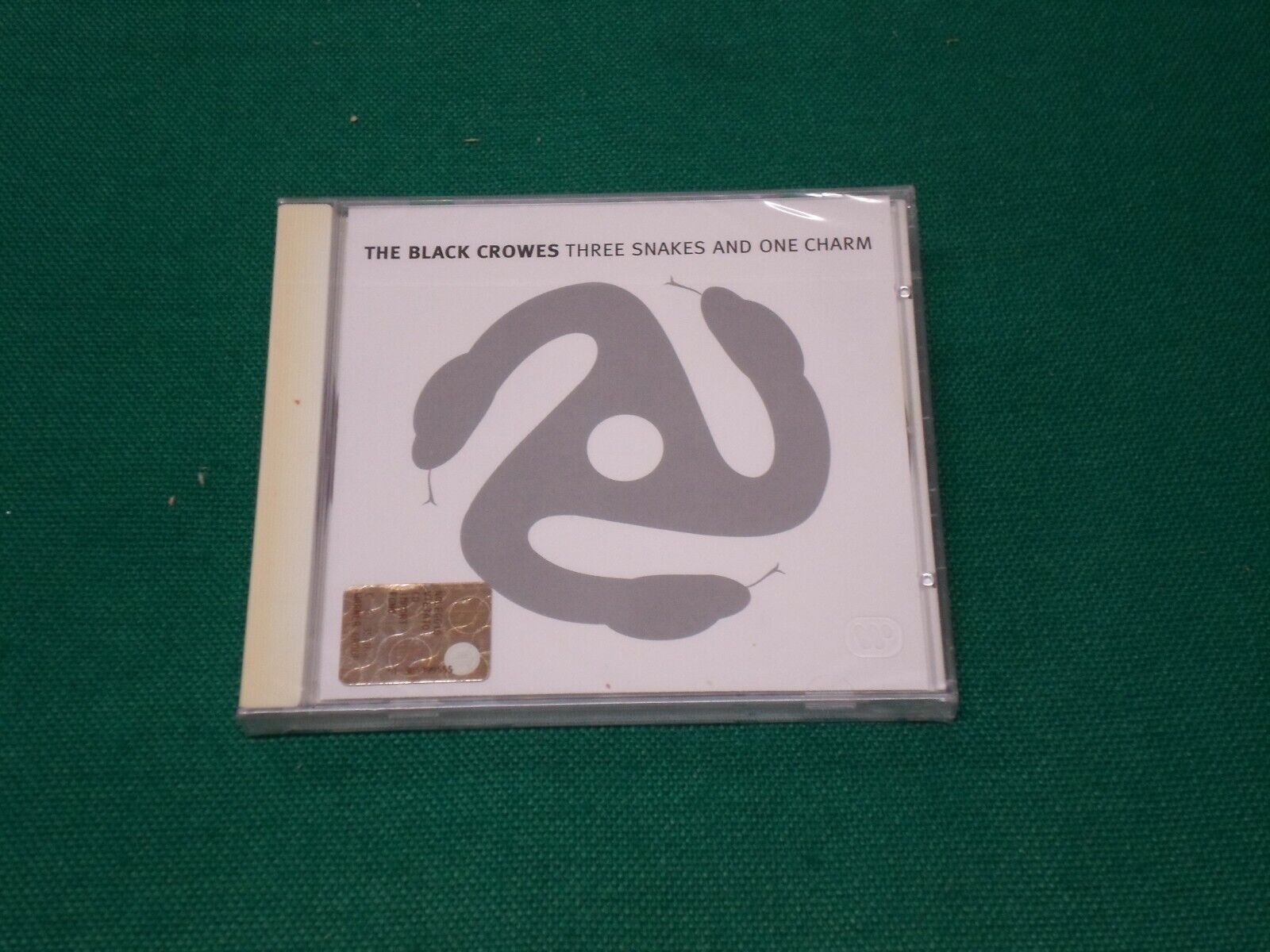 The Black Crowes ‎– Three Snakes And One Charm cd